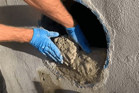 fixing holes in concrete walls